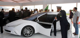 Illustration for article titled Moammar Gadhafi's Custom-Built Not-So-Rocket Car